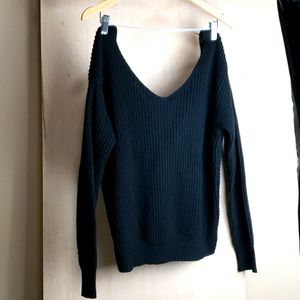 Cable knit knotted sweater